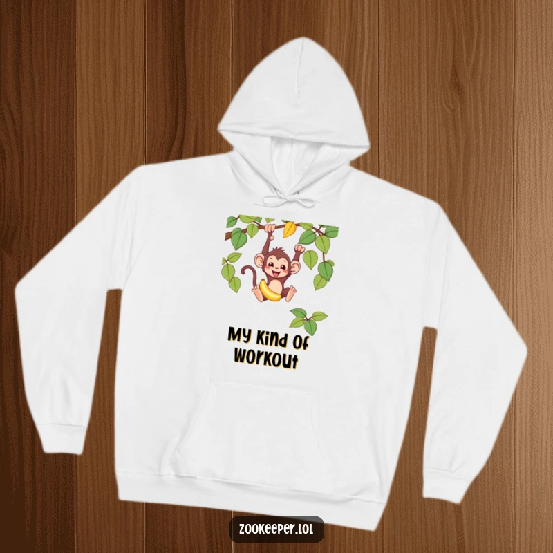 Funny monkey hoodie with a mischievous monkey swinging from a vine, holding a banana, a cozy and humorous apparel choice.