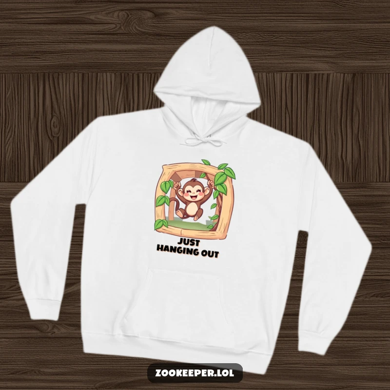 Funny Monkey Hoodie: A joyous monkey is captured mid-swing from a vine, embodying playful energy and happiness.
